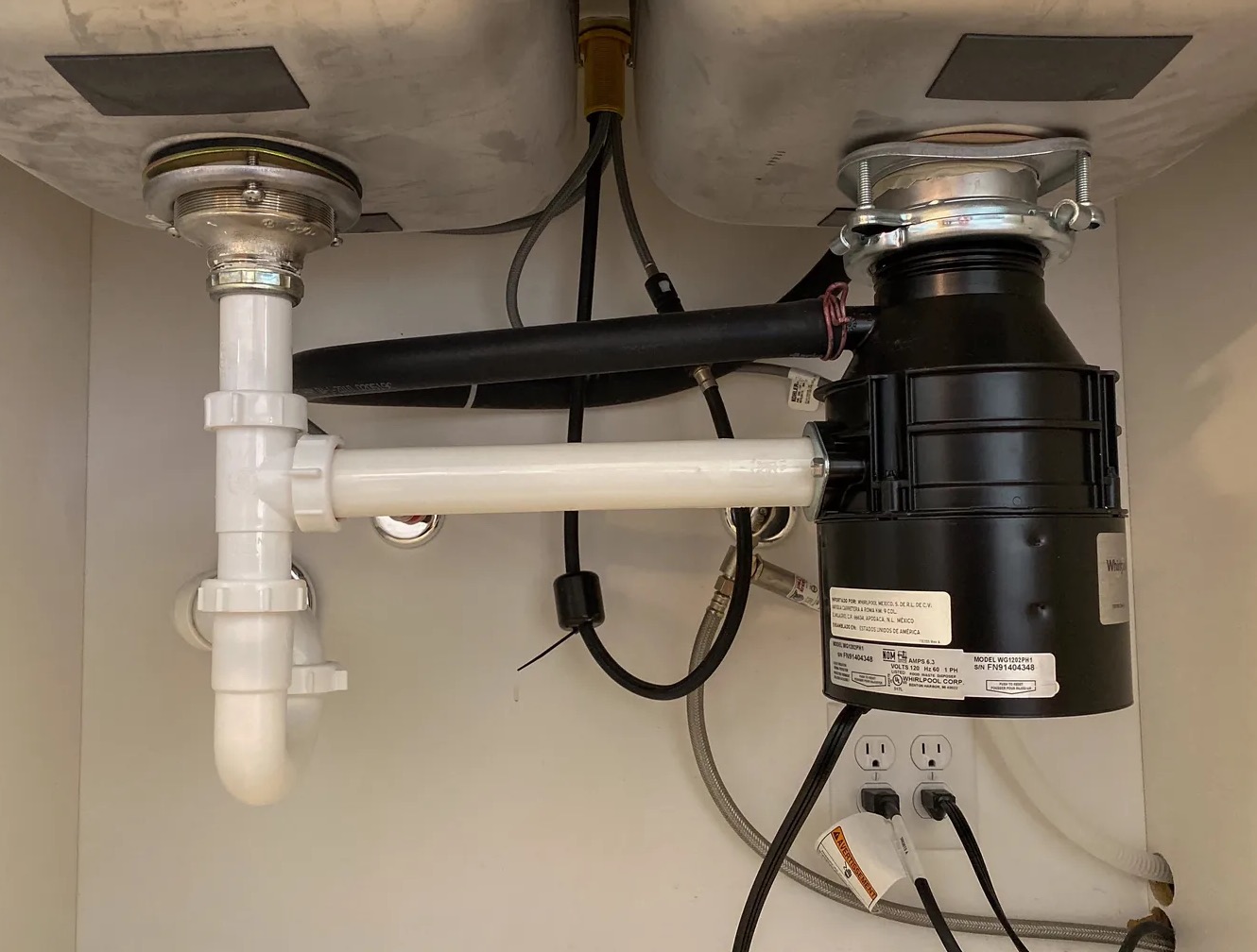 Leaky Garbage Disposal Cleanup in Tucson, AZ